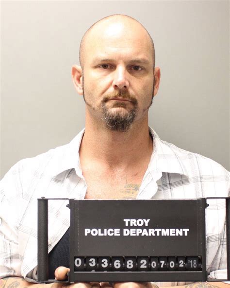Troy man faces gun, drug charges following traffic stop